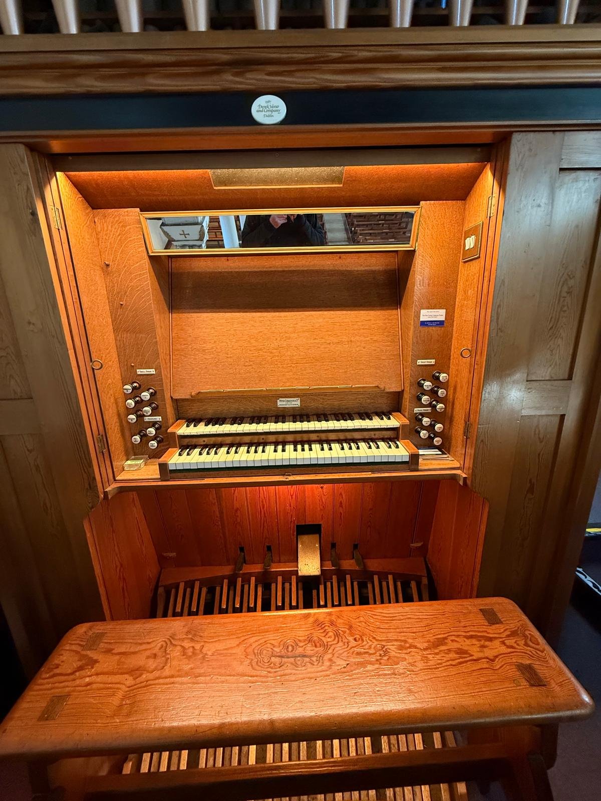Organ console showing stop knobs and manuals